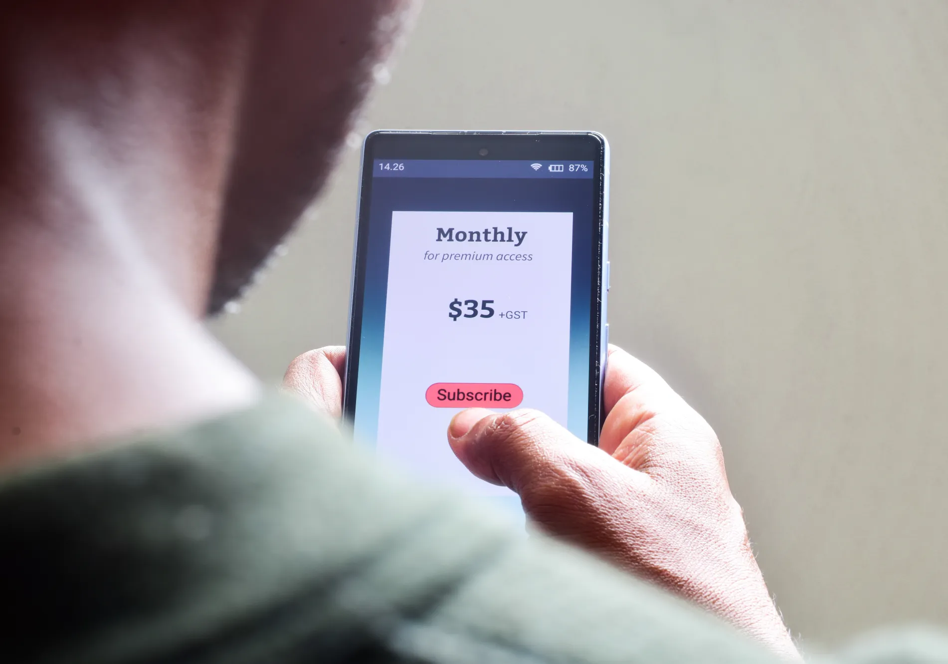 Man managing monthly subscription plan Man managing monthly subscription plan