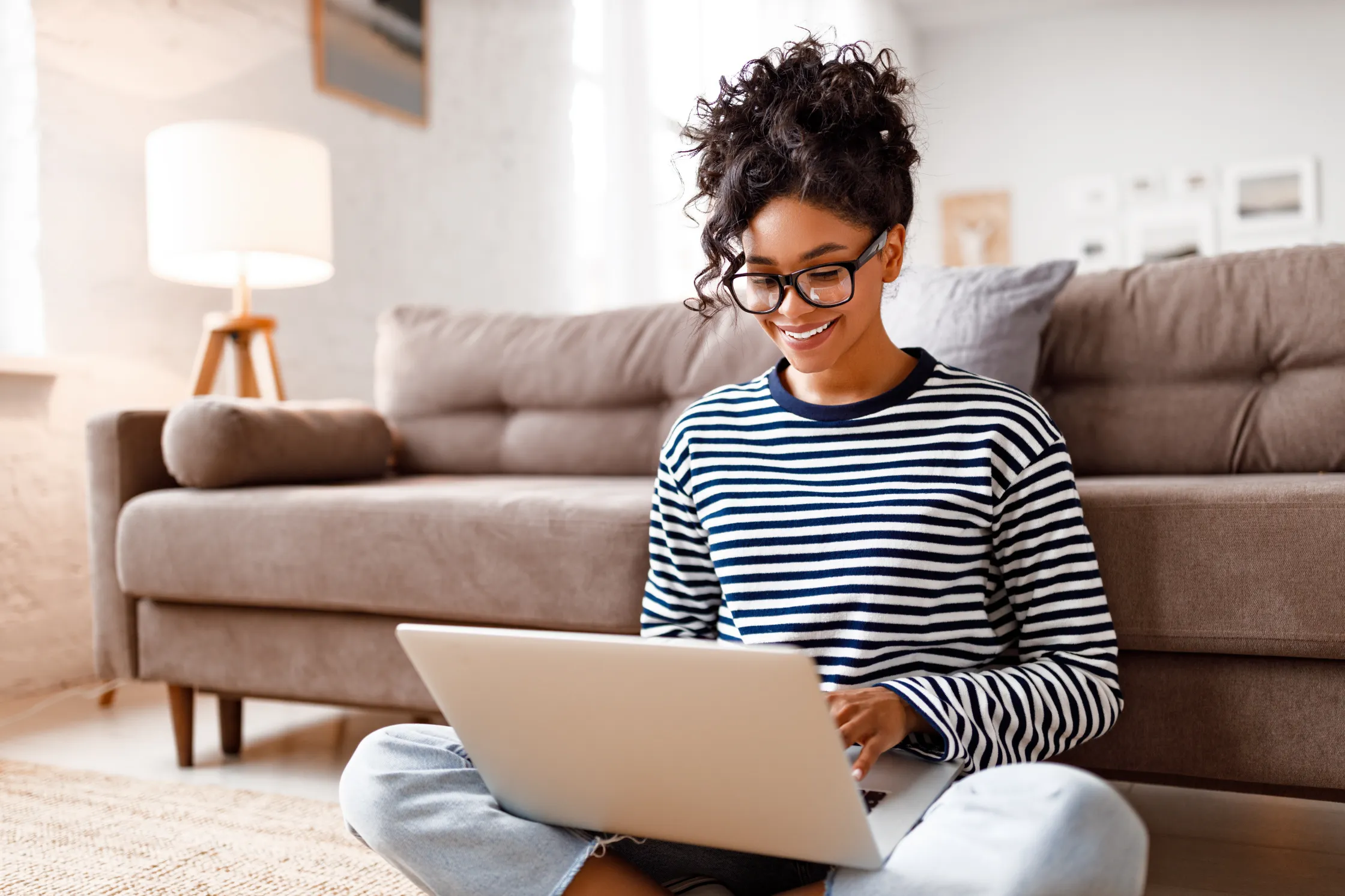 woman using laptop at home