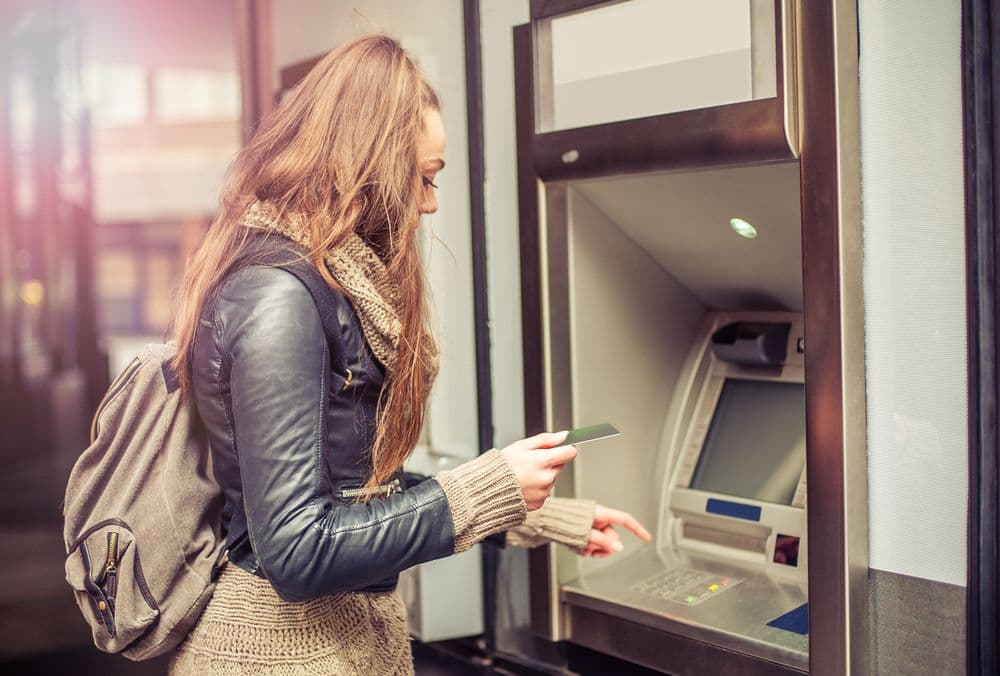 girl-overdrafting-from-atm-machine