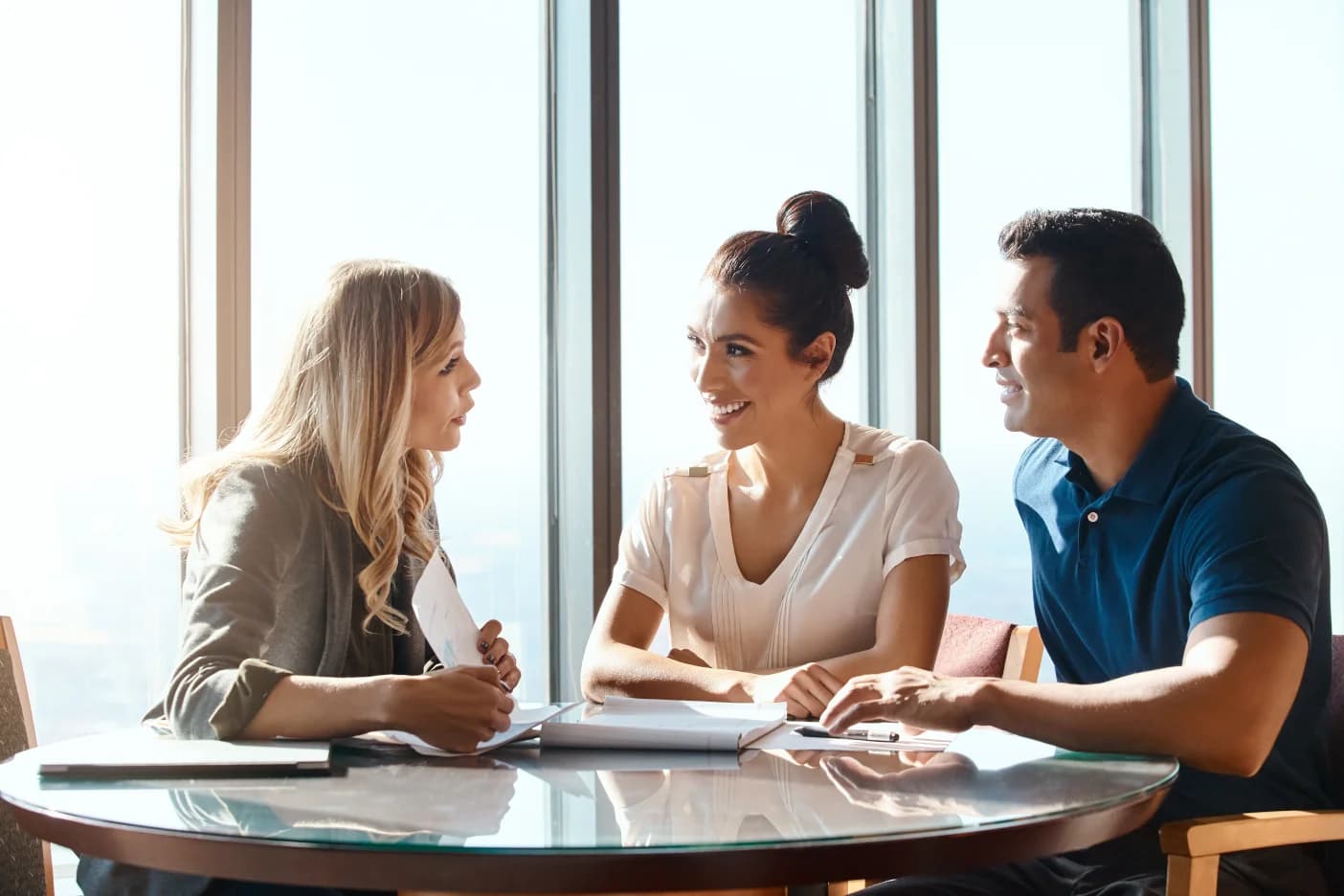 canadian-investor-comparing-RRSP-and-TFSA-options-with-a-couple-with-tax-documents-and-a-calculator-on-the-desk